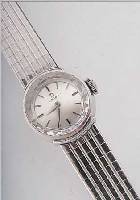OMEGA DAMENGOLDBANDUHR, REF.-NR. 477704, SCHWEIZ UM 1962, WG 750/000 INCL. WG-BAND, ORIG.-ETUI, GARANTIEKARTE M. HERKUNFTSNACHW., BODEN GEDR., ...