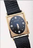 LONGINES HERRENARMBANDUHR, SCHWEIZ/USA UM 1962, GG-FILLED, LüNETTE OVAL NACH INNEN GEZ.,BODEN GEDR., BLATT REST., 1/4 STD.-ZEICHEN M. IN WG GEF. ...