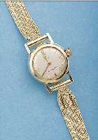 STOWA DAMENGOLDBANDUHR AUTOMATIK, DEUTSCH- LAND/SCHWEIZ UM 1958, GG 585/000 INCL. GG- FLECHTBAND U. SICHERHEITSKETTCHEN, BODEN GE- SCHR., BEI ...