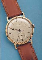 ONSA HERRENARMBANDUHR, REF.-NR. 1063/2, SCHWEIZ UM 1956, RG 750/000, BODEN U. GLASR. GEDR., ORIG.-BLATT ALTERSBED. FL., KL. SEK. TEILVERT., ...