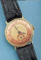 ENICAR HERRENARMBANDUHR ART DECO, SCHWEIZ UM1940, METALL GG-AUFLAGE, BODEN U. GLASR. GE- DR., 2-FARB. BLATT, RUNDANKERW., 15 ST., HAND-AUFZUG, ...