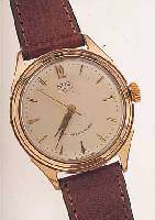 GUB HERRENARMBANDUHR, REF.-NR. 220525, DEUTSCHLAND UM 1958, METALL VERG., BER., EDELST.-SCHR.-BODEN, INDIR. ZENTRALSEK., 16 ST., ...