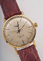 LONGINES HERRENARMBANDUHR FLAGSHIP AUTOMATIK, REF.-NR. 3403, SCHWEIZ UM 1965, GG 750/000, BODEN U. GLASR. GEDR., VERS. BLATT FL., RUND- ANKERW. M. ...