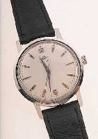 MOVADO HERRENARMBANDUHR, REF.-NR. 18341, SCHWEIZ UM 1954, EDELST., BODEN GESCHR., BLATT VERS., RUNDANKERW., 17 ST., HANDAUFZUG- KAL. 127, ...
