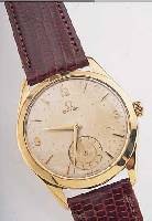 OMEGA HERRENARMBANDUHR, REF.-NR. 2619, SCHWEIZ UM 1953, GG 750/000, BODEN U. GLASR. GEDR., VERS. ORIG.-BLATT FL., KL. SEK. TEIL- VERT., ...