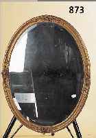 WANDSPIEGEL, FRANKREICH, UM 1900, HOLZRAHMEN GESTUCKT UND GOLDFARBEN GEFASST, FACETT. GLASEINSATZ, OVAL CA. 90 X 68 CM