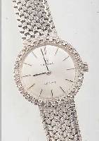 OMEGA DAMENGOLDBANDUHR DE VILLE, SCHWEIZ UM 1968, NEUTR. WG 750/000-RUNDGEH. INCL. WG- BAND RHOD., LüNETTE AUFWEND. M. 20 8/8 DIAMAN-TEN ZUS. ...