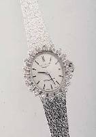 LONGINES DAMENSCHMUCKBANDUHR, SCHWEIZ UM 1972, NEUTR. WG 750/000-GEH. INCL. BAND RHOD.,OVALLüNETTE AUFWEND. M. DIAMANTBES., 20 8/8 DIAMANTEN ...
