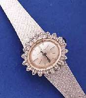 ZENITH DAMENSCHMUCKBANDUHR, SCHWEIZ UM 1972,NEUTR. WG 750/000-GEH. RHOD., MINERALFLACHGL.,M. SCHMUCKSCHL., LÜNETTE AUFWEND. M. 20 8/8 DIAMANTEN ...