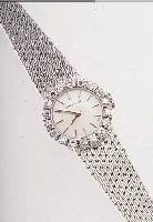 LONGINES DAMENSCHMUCKBANDUHR, SCHWEIZ UM 1972, NEUTR. WG 750/000-GEH. INCL. WG-BAND RHOD., AUFWEND. LüNETTE, 14 8/8 DIAMANTEN ZUS.CA. 0,23 ...
