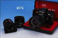 LEICA R4 1560831 BJ.1982 MADE IN PORTUGAL; DAZU ELMARIT-R 28MM 1:2.8; SUMMICRON-R 50MM 1:2 UND VARIO-ELMAR-R 28-70MM 1:3.5-4.5; ALLE IM ORIG. ...