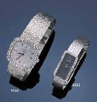 ROLEX DAMENSCHMUCKBANDUHR, REF.-NR. N375, SCHWEIZ UM 1965, WG 750/000 INCL. WG-MILA- NAISEBAND, BODEN GEDR., DIAMANTLüNETTE, RUND- ANKERW., ...