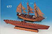 KONVOLUT AUS ZWEI MODELLBOOTEN, DEUTSCH, 60ER JAHRE, 1 X U-BOOT-MODELL AUS LEIMHOLZ, L. CA. 71 CM; 1 X DREIMASTER MIT VOLLER TAKELAGE, H. ...