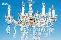 DECKENLEUCHTER, ITALIEN, 50ER JAHRE, GLASUMMANTELTE METALLMONTUREN, ACHT BRENN- STELLEN, REICHER FACETTIERTER GLASBEHANG, ELEKTR. ...