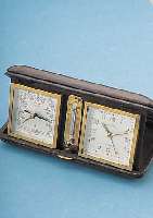 METONOME ETUIWECKER KOMBINIERT M. THERMOME- TER UND BAROMETER, 7 ST., GEHFäHIG, LEDER- ETUI, AUFSTELLBAR, DEUTSCHLAND UM 1955, MAßE GESCHL. ...
