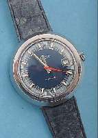 MIREXAL HERRENARMBANDUHR ELECTRONIC, REF.- NR. C750487, SCHWEIZ UM 1970, MASSIV EDEL- STAHL, BOD. AUFGEDR., BEI FERT.-STELL. WASSER-G., ...