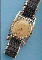LONGINES HERRENARMBANDUHR, SCHWEIZ/USA UM 1955, GG-FILLED, BET. BANDANST., ZUGGLIEDERB.,BODEN U. GLASR. GEDR., KAL. 10L, HANDAUFZUG, SCHR.-UNR., ...