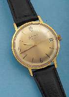 GLASHÜTTE HERRENARMBANDUHR, DEUTSCHLAND UM 1964, METALL HARTVERG., EDELST.-BODEN GEDR., 17 ST., DATUM, HANDAUFZUGKAL. 69,1, RINGUNR., FLACHSPIR., ...