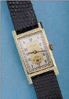 ARCTOS HERRENARMBANDUHR, REF.-NR. 186342, DEUTSCHLAND UM 1937, GG 585/000, RECT.-FORM, BODENSCHARNIER, 2-FARB. ORIG.-BLATT, GEBL. STAHLZEIGER, ...