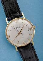 ANGELUS HERRENARMBANDUHR AUTOMATIK DATOGRAPH, REF.-NR. 1715A, SCHWEIZ UM 1956, GG 750/000, BODEN U. GLASR. GEDR., VERS. BLATT, 17 ST., ...