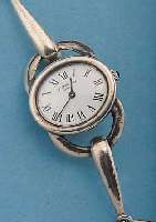 CHOPARD DAMENARMBANDUHR, SCHWEIZ UM 1970, 925ER SILBER, SILBERBAND MASSIV VERARB. IN FORM EINER TRENSE, BODEN GEDR., EMAILFARB. BLATT, ...