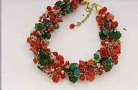 COLLIER UND P. OHRGEHäNGE, BöHMEN/GABLONZ, CA. 50ER JAHRE FüR PARISER HAUTE COUTURE, FRüCHTE, BLäTTER UND FACETT. GLASTEILE, Z.T. VOR DER ...