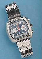 SABINA ARMBANDCHRONOGRAPH, SCHWEIZ UM 1972, EDELST. MASSIV, NEUTR. EDELST.-BAND, BODEN GESCHR., 30-MIN.-STOPPZäHLER, DATUM, 17 ST., ...