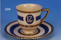 MOKKATASSE MIT UNTERTASSE, HEINRICH & CO. SELB, 1928, BORDGESCHIRR DES LUFTSCHIFFES LZ GRAF ZEPPELIN, SOG. KNOCHENPORZELLAN, EL- ...