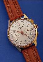 TRANSMARINE ARMBANDCHRONOGRAPH, SCHWEIZ UM 1958, METALL ROSé VERG., EDELST.-BODEN UND GLASR. AUFGEDR., 45 MIN. STOPPZäHLER, 17 ST., HANDAUFZ., ...
