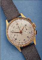 TRANSMARINE ARMBANDCHRONOGRAPH, SCHWEIZ UM 1958, METALL ROSé VERG., EDELST.-BODEN UND GLASR. AUFGEDR., 45 MIN. STOPPZäHLER, 17 ST., HANDAUFZ., ...
