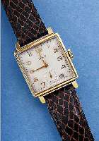 LACO HERRENARMBANDUHR, DEUTSCHL. UM 1940, 585ER GG, SCHARNIERB., CAREEFORM, RUNDANKERW.,HANDAUFZ. KAL. 526, 16 ST., SCHRAUBEN-UNR., FLACHSPIR., ...