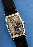 POUW HERRENARMBANDUHR, DEUTSCHL. UM 1940, METALL VERN., REG.- TANGULERFORM, BEIDSEITIG VERGL., BOD. AUFGEDR., 2 FARBIG VERS. BLATT, FORMANKERW., ...
