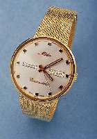 MIDO HERRENARMBANDUHR AUTOMATIC/COMMANDER, SCHWEIZ UM 1995, EDELST. INCL. FLECHTB. HART- VERG., TAG U. DATUM, ORIG. ETUI, PAP., GARAN- TIEKARTE ...