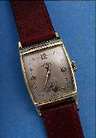 ELGIN ARMBANDUHR, USA UM 1950, GG-FILLED, BOD. AUFGEDR., PERFEKT REST., 21 ST., FORM- ANKERW., HANDAUFZ., KAL. 670, SCHR.-UNR., BREG.-SPIR., ...