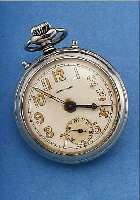JUNGHANS TASCHENWECKER, DEUTSCHL. UM 1930, NICKEL, AUFSTELLBAR, EMAILBL. BESCH., 7 ST., AKUSTIK AUF INNENGLOCKE, GEH- U. WECKWERK ...
