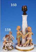 PORZELLANGRUPPE, THüRINGEN, UM 1890/1900, ZWEI PUTTEN MIT SCHREIBTAFEL, BUNTE BEMALUNG, H. 12 CM, ALTE RESTAURATIONSSTELLEN SOLLTEN ERNEUERT ...