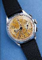 BENEDICT WATCH ARMBANDCHRONOGRAPH, SCHWEIZ UM 1947, MET. VERCHR., EDELST.-BOD. U. GLASR. AUFGEDR., BLATT ALTERBED. FARBL. GETöNT, 30 MIN. ...