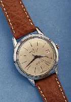 BREITLING HERRENARMBANDUHR UNIDATE AUTOMATIK, REF.-NR. 64/26, SCHWEIZ UM 1950, METALL VERCHROMT (BERIEBEN), EDELSTAHLBODEN AUFGEDR.,ORIG. BLATT ...