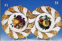 ZIERTELLER, MEISSEN, UM 1870, 1. WAHL, PORZELLAN, RELIEFIERTER TEILVERGOLDETER RAND, MITTIG BUNT BEMALTES OBSTBOUQUET, D. CA. 28 CM