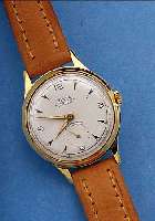 KIENZLE HERRENARMBANDUHR AUTOMATIK, DEUTSCHL. UM 1956, METALL VERG., EDELSTAHLBOD.GEDR., SOGEN. VOLKSAUTOMATIK, KAL. 57/17, 17 ST., ...