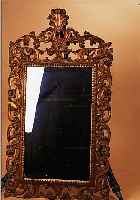SPIEGEL, UM 1900, HOLZ GESCHNITZT U. REICH GESTUCKT, SPIEGELGLAS SEK., H. 124 CM, L. FARBABBLäTT./ALTERSSP.