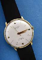 KIENZLE HERRENARMBANDUHR SUPERIA, DEUTSCHL. UM 1964, METALL VERG. EDELSTAHLBOD. AUFGEDR., FLACHE AUSFüHRUNG, SPITZENMODELL, 17 ST., ...