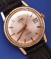 CAMY HERRENARMBANDUHR SUPERAUTOMATIK, REF.- NR. 56, SCHWEIZ UM 1964, GG 750/000, BODEN GESCHR., 25 ST., BASISKAL. ETA 2472, INCABL., LEDERB. NEU, ...