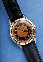 MOVADO HERRENARMBANDUHR, REF.-NR. A278504, SCHWEIZ UM 1948, EDELST., BODEN GESCHR., Lü- NETTE, SCHULTERN U. KRONE IN RG, ORIG.-BLATT ALTERSBED. ...