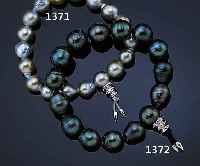 POWER-ARMBAND AUS TAHITI-ZUCHTPERLEN, SCHLIEßE WG 750/000 MIT 24 BRILLANTEN ZUS. CA.0.17 CT WEIß/VS-P1, 15 PERLEN DURCHM. CA. 11- 11.5 MM ...