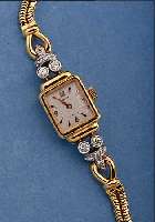 ANKER/HERWALT DAMENARMBANDUHR, DEUTSCHL. UM 1940, GG 585/000 INCL. GG-SCHLANGENGLIEDER- B., BANDANST. AUFWEND. M. IN WG GEF. BRILLAN- TEN U. ...