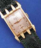 ELGIN HERRENARMBANDUHR DELUXE, USA UM 1950, GG-FILLED, AUFWEND. RECT.-FORM, BODEN GEDR., VERS. BLATT, FORMANKERW., 17 ST., KAL. 672, SCHR.-UNR., ...