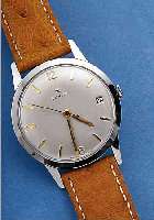 ZENITH HERRENARMBANDUHR, REF.-NR. 9451300, SCHWEIZ UM 1962, EDELST. POL., D. CA. 36 MM, BODEN U. GLASR. GEDR., BLATT REST., LEDERB. NEU, 17 ST., ...