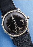 HELVETIA FLIEGERARMBANDUHR, SCHWEIZ UM 1932,NICKELGEH., SCHARNIERBODEN, ORIG.-BLATT FL., 15 ST., ANKERW., SCHR.-UNR., FLACHSPIR., FRüHE ...