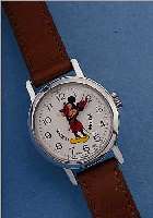 COMICUHR MICKEY MOUSE, WALT DISNEY PROD., SCHWEIZ UM 1975, METALL VERCHR., D. CA. 25 MM, STIFTENANKERW., STOßGES., LEDERB., EZ 2
